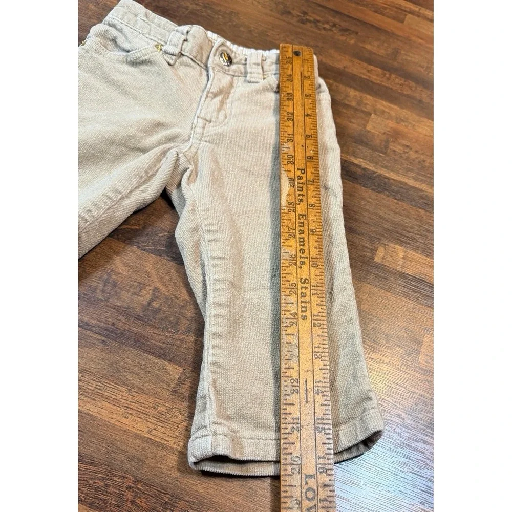 Vintage girls tan corduroy pants with glitter and heart pockets.  Sz 18 months.